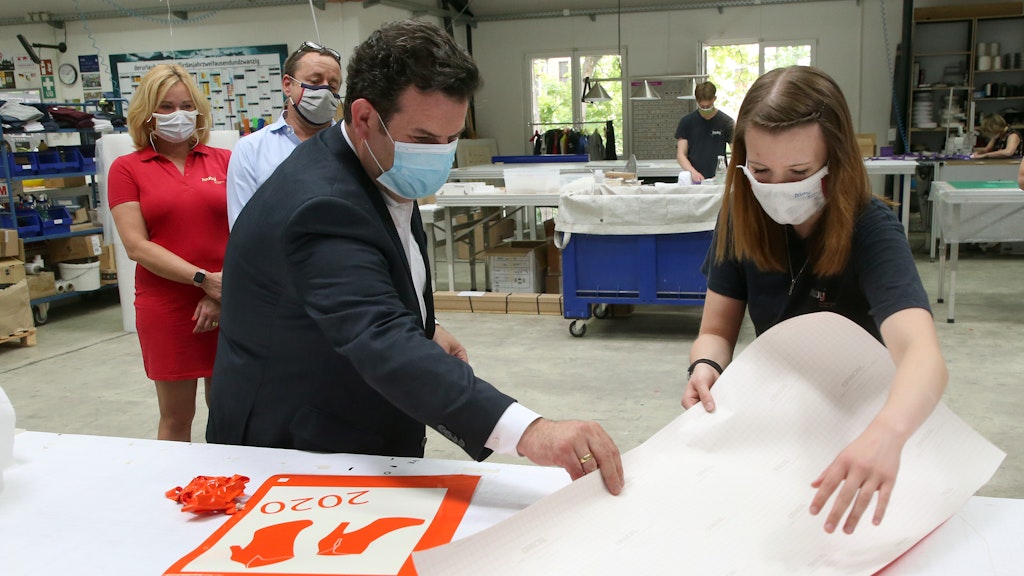 Arbeitsminister Hubertus Heil zu Besuch in einer Kreuzberger Werbefirma.