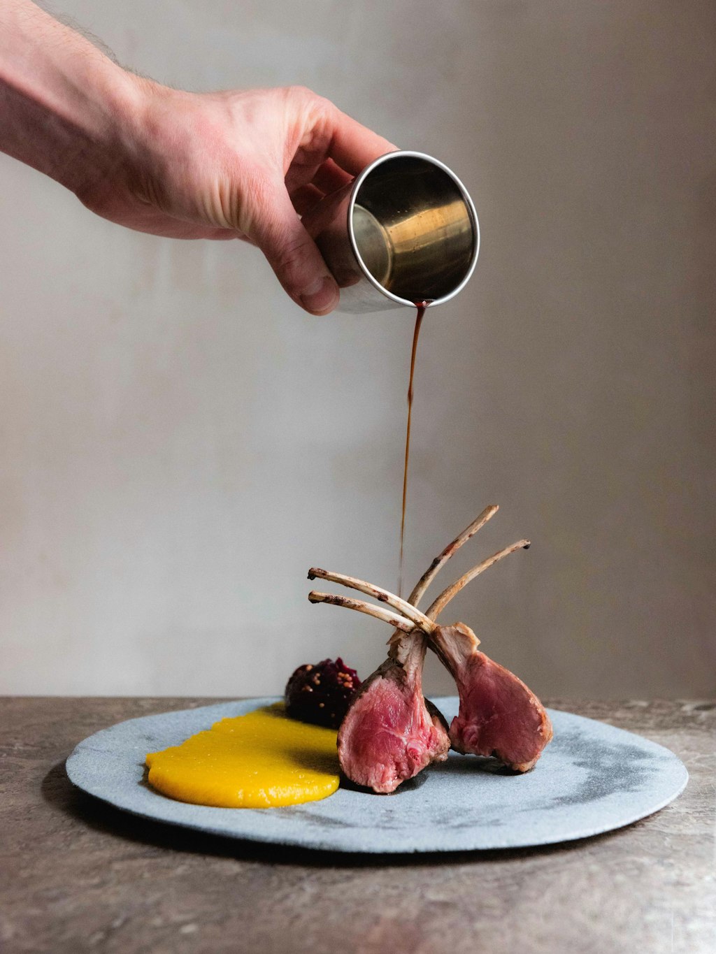 Delicious: rack of lamb, pureed yellow beetroot, red cabbage chutney, bone jus.