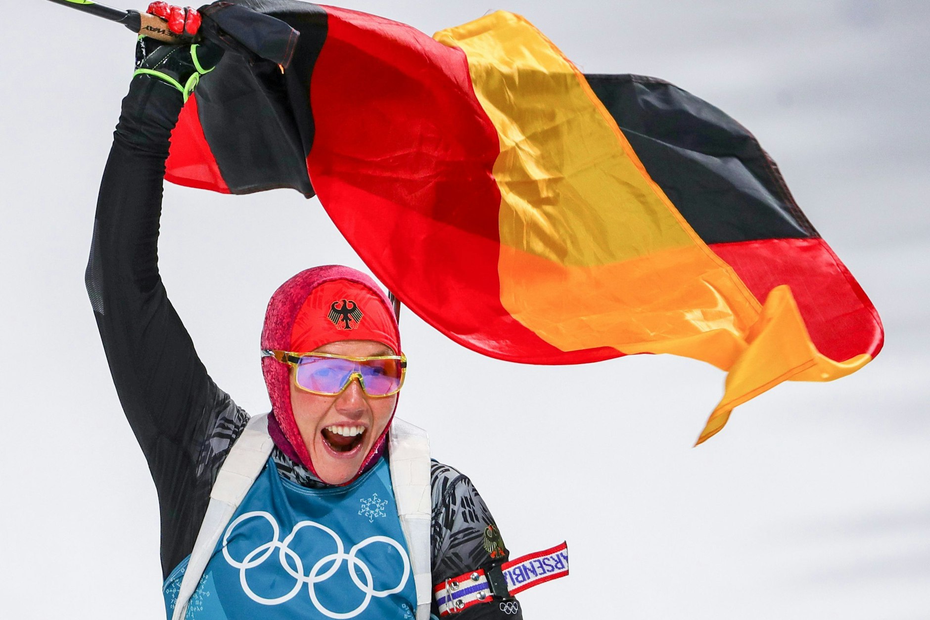 2018, Südkorea: Laura Dahlmeier jubelt im Ziel über die zweite Goldmedaille.