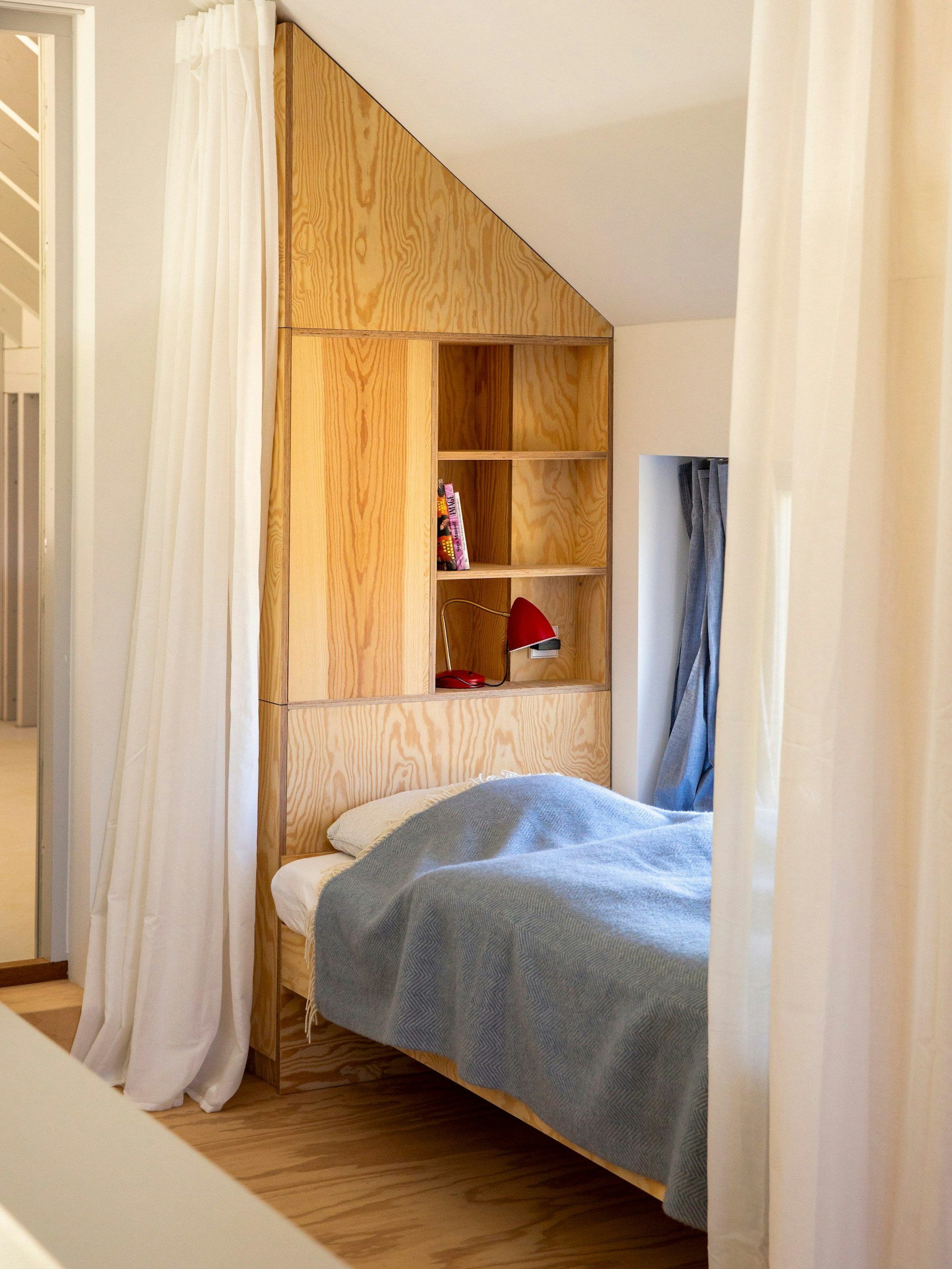 In the gallery area of the “Buche” house there are plywood sleeping bunks.